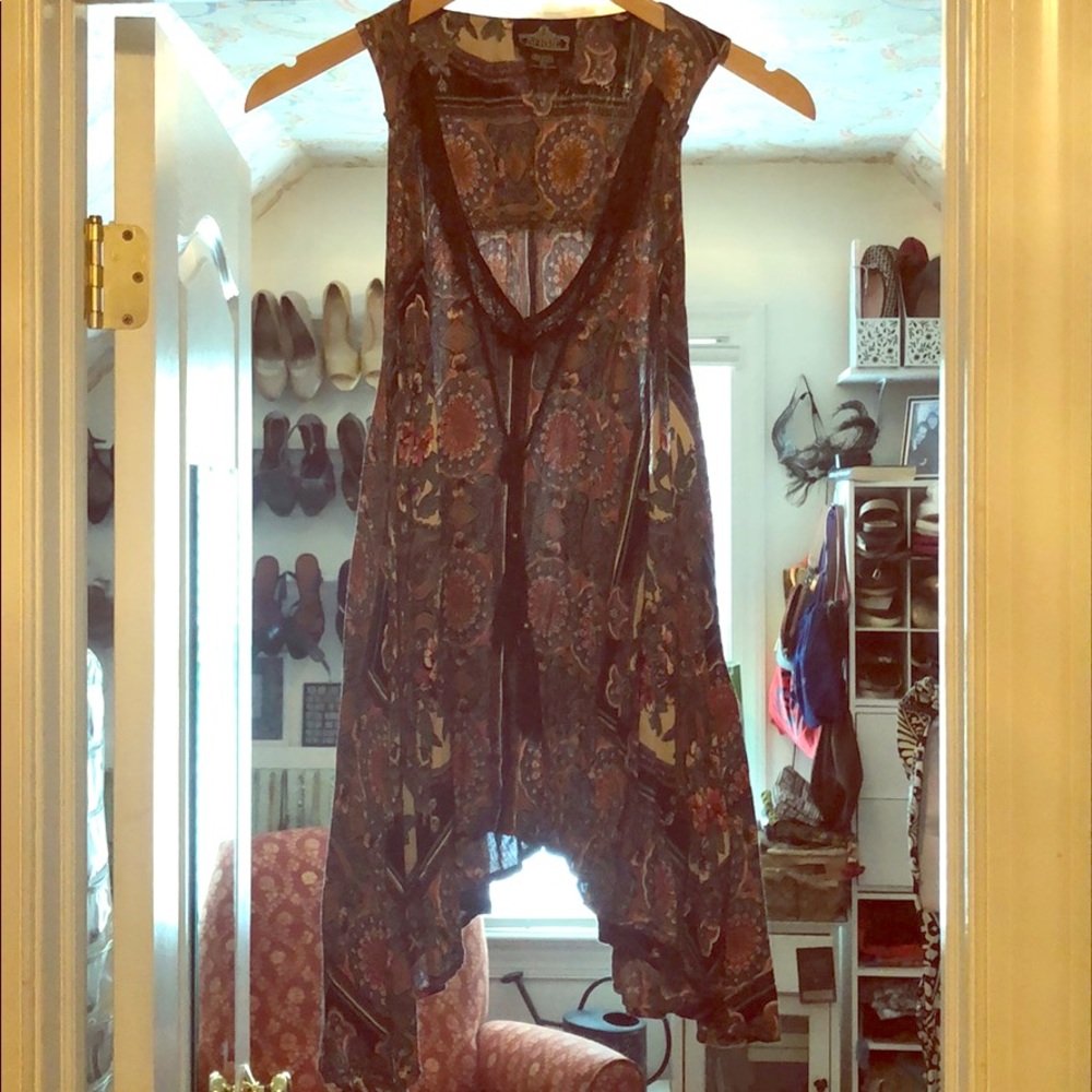 Angie sleeveless swing top L